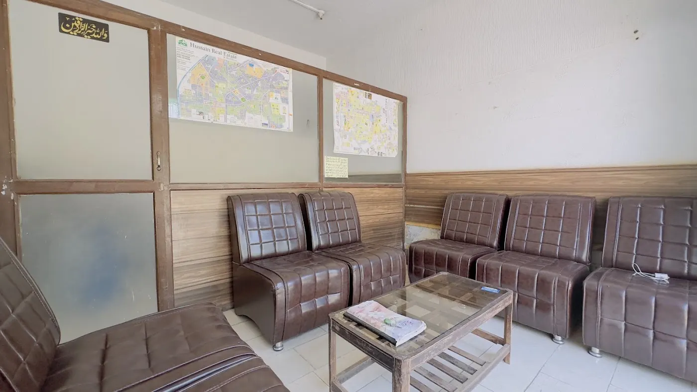 The office with scheme maps on the wall and the dealing table